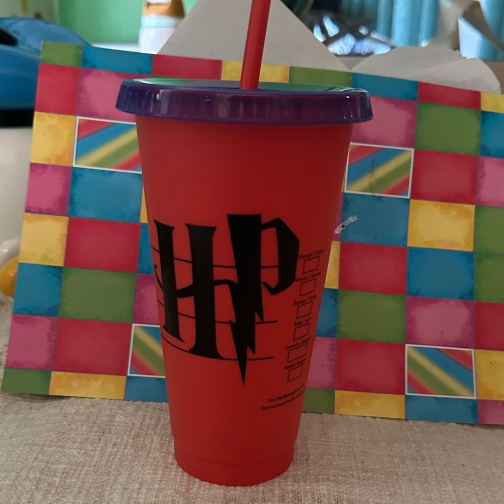 Red HP Tumbler with Purple Lid